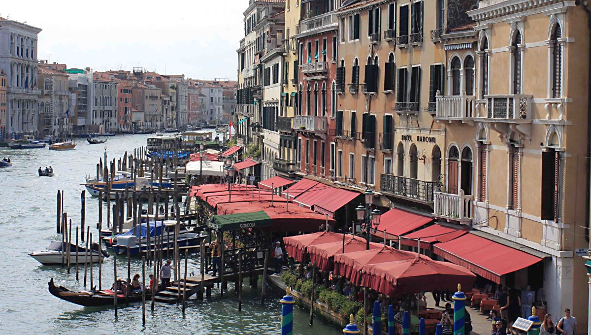 Cafes, restaurants and hotels align the canal in the Rialto area