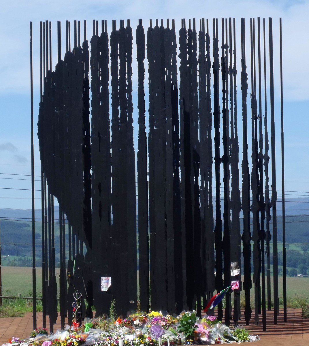 There are 50 steel columns that make up this sculpture and you have to stand in the right spot to see the face. 