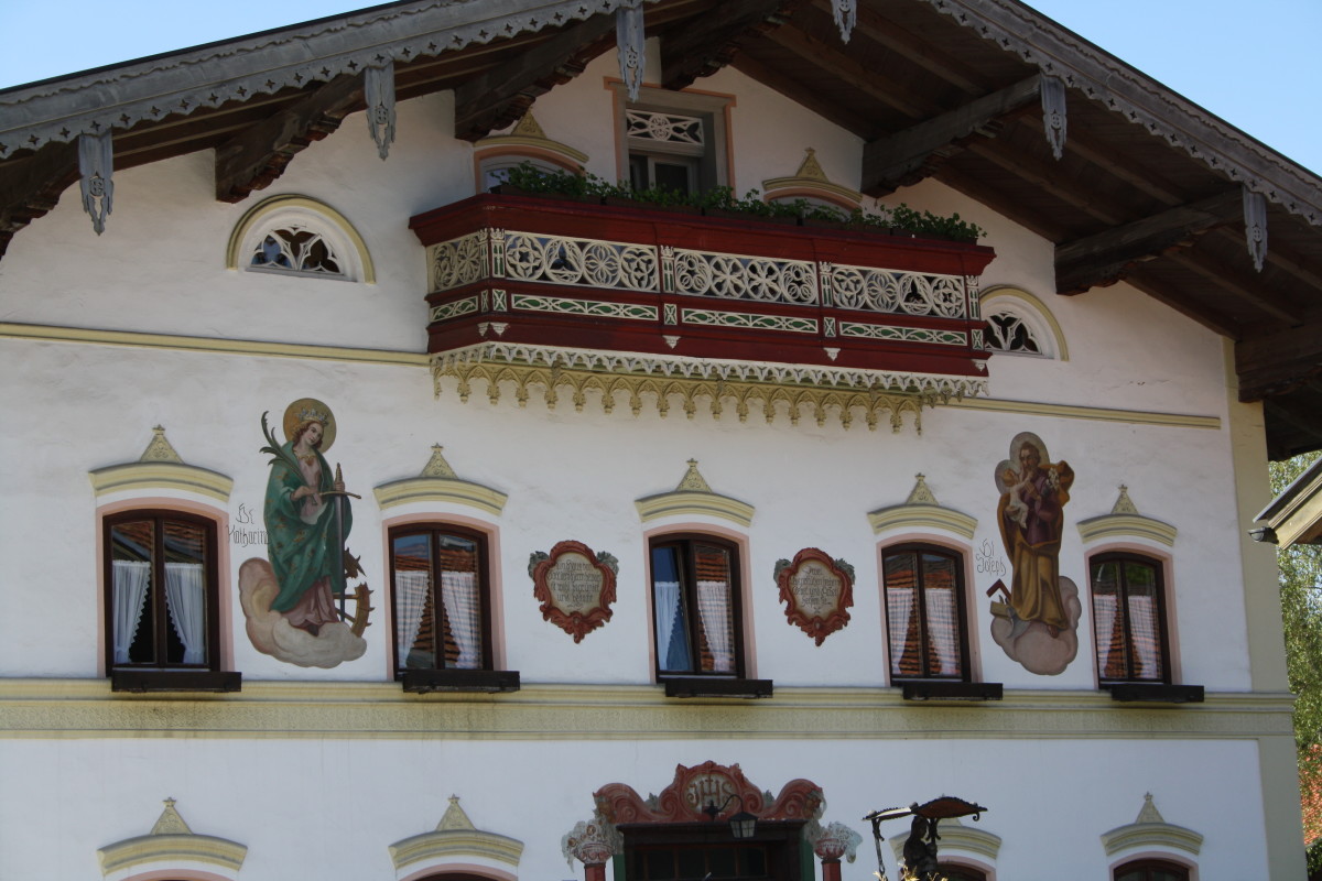 Typical Bavarian house with paintaings of saints on the outside wall. Samerberg, Bavaria, Germany