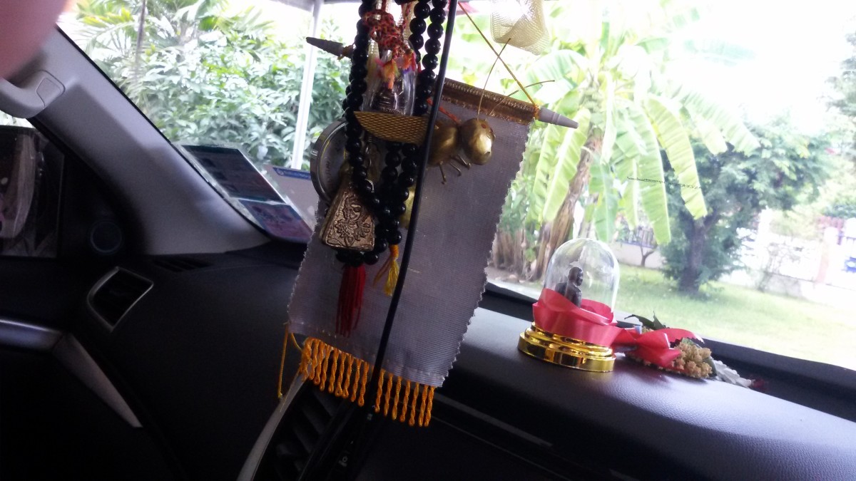 A Buddhist amulet carried in my car.