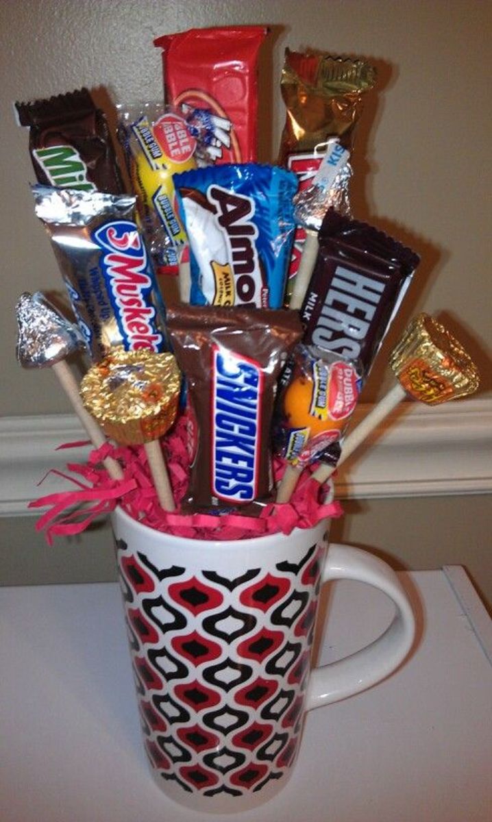 Attaching sticks to chocolate bars  Candy bouquet, Homemade birthday  gifts, Candy bar bouquet