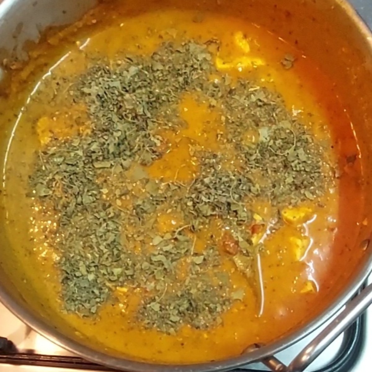 Add 1 tablespoon crushed kasuri methi or dried fenugreek leaves. Mix well.
