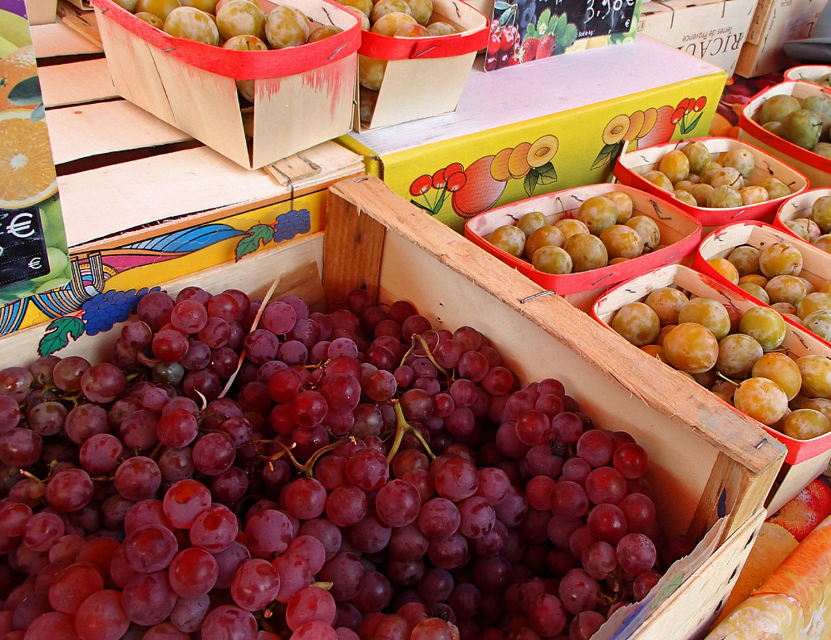 Provence's bountiful summer crops: grape, strawberry, raspberry, prune, apricot, peach, and melon.