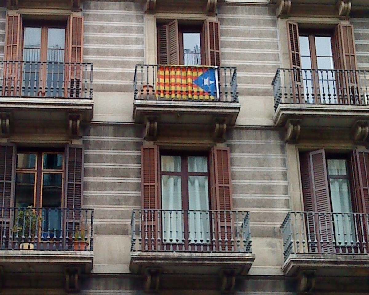 Barcelona - flag of Catalunya on a typical balcony.