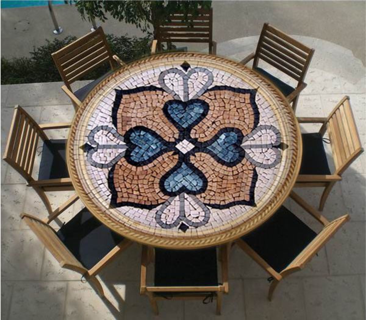Patio table with geometric mosaic.