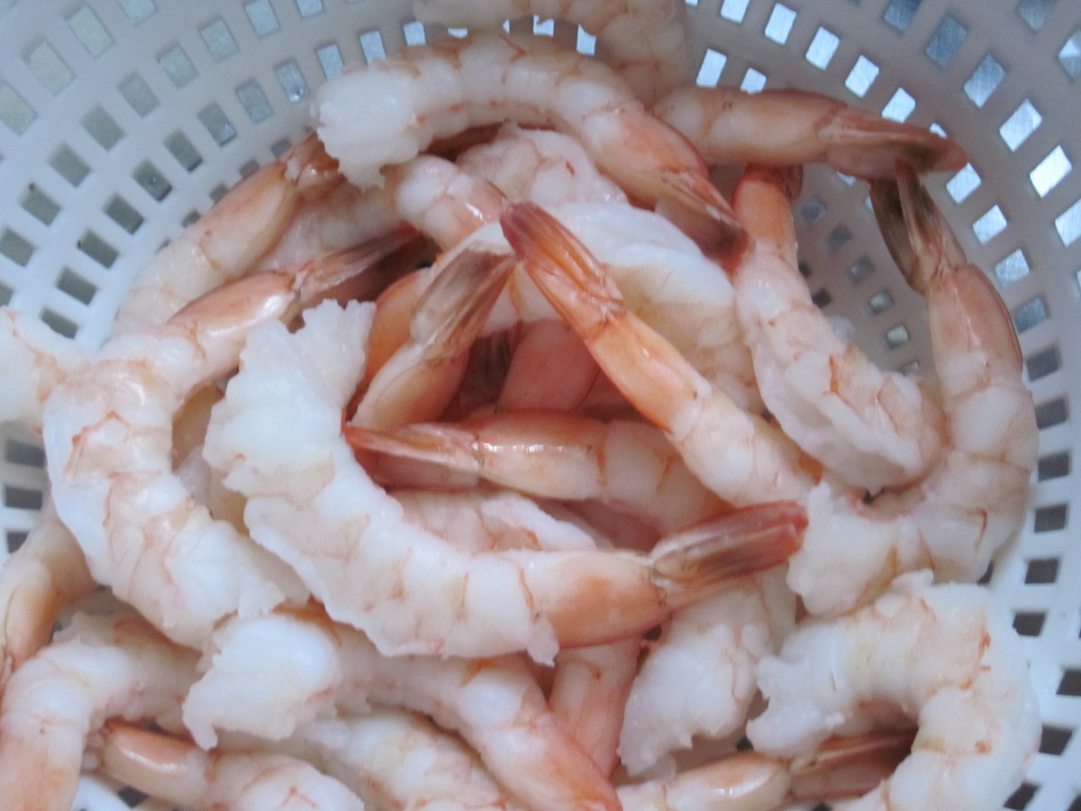 Rinse Shrimp with cold water to Thaw. Pat dry with paper towels.
