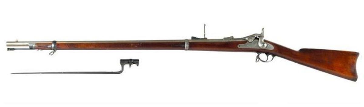 The Springfield Model 1873 trapdoor rifle and socket bayonet used at Fort Mackinac. Mfg by Springfield Armory.   