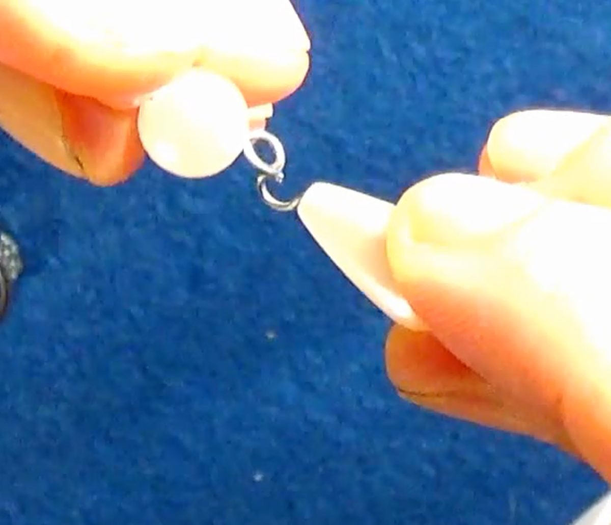 making-a-pair-of-white-pearl-wedding-earrings