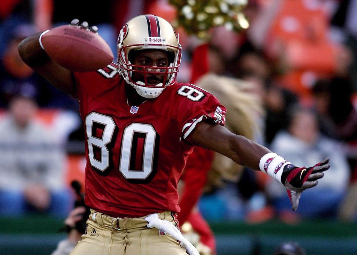 Jerry Rice strikes a pose during the game.