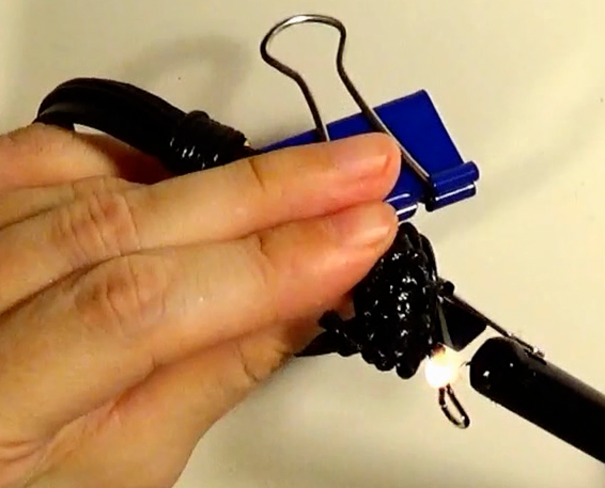 black-leather-bracelet-with-metal-link-and-sliding-knot