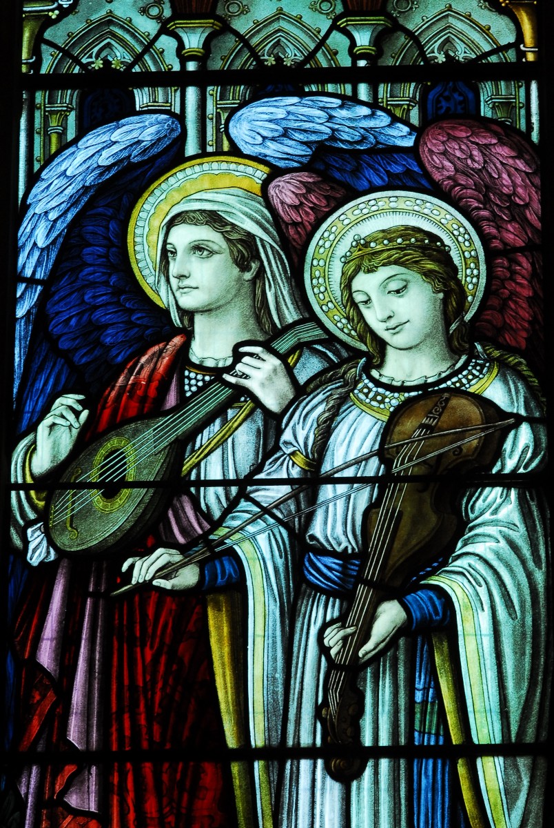 Angels, musicians, and female faces.