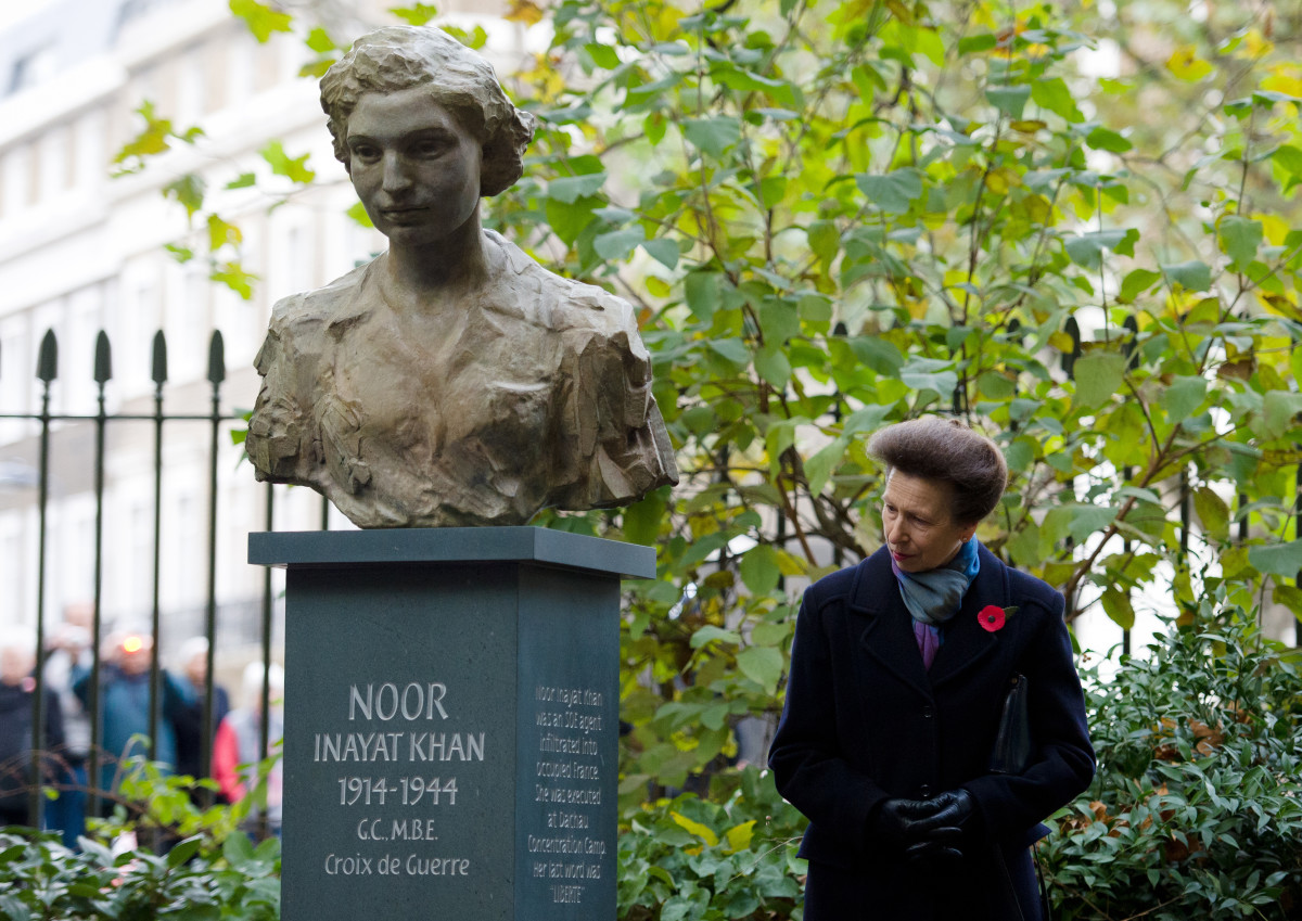 Britain's Princess Anne looks at a sculpture of India's Noor Inayat Khan after an unveiling ceremony in central London, on November 8, 2012.