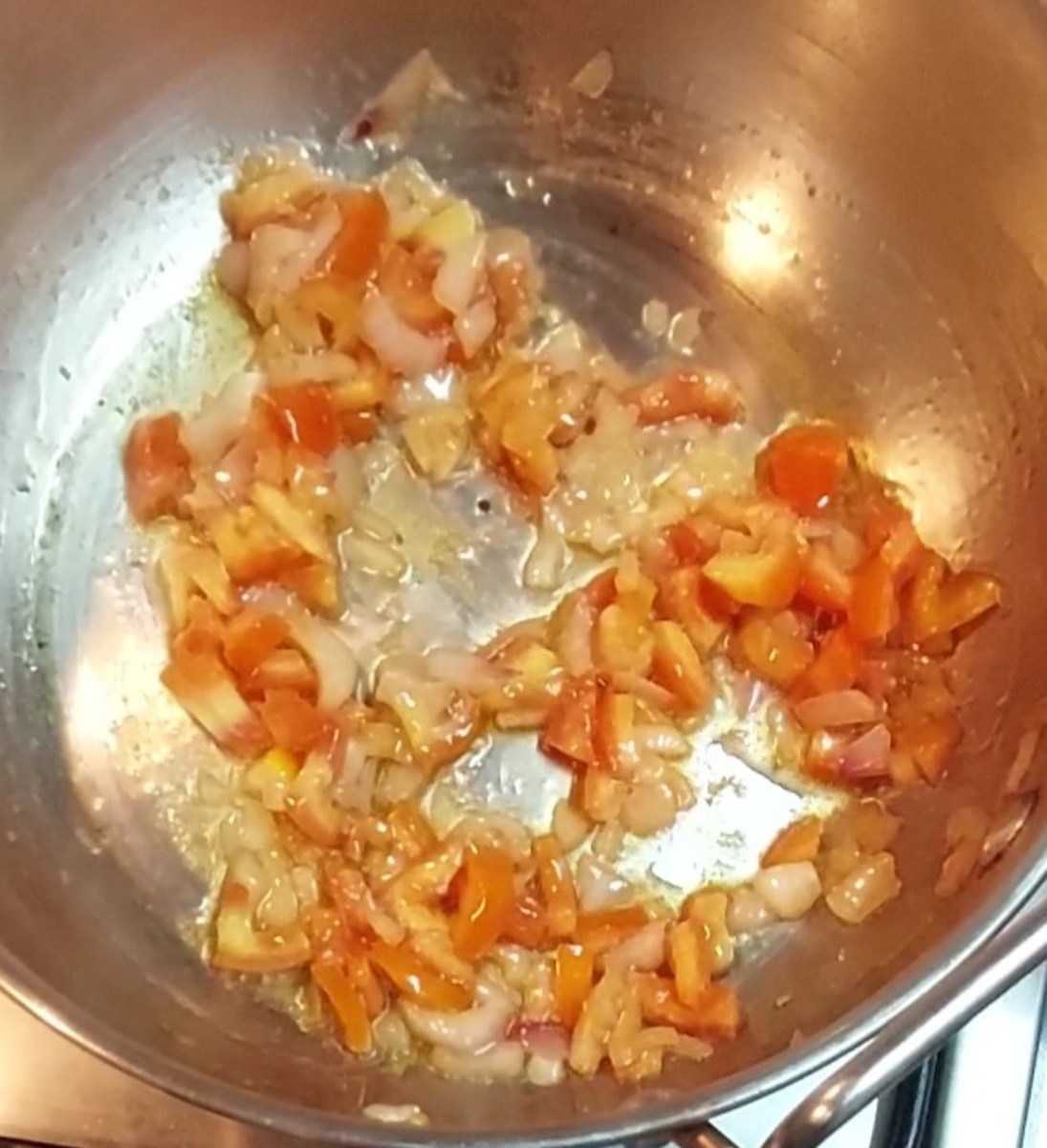 Add 1/2 cup tomato and fry till it shrinks. No need to cook till soft and mushy.