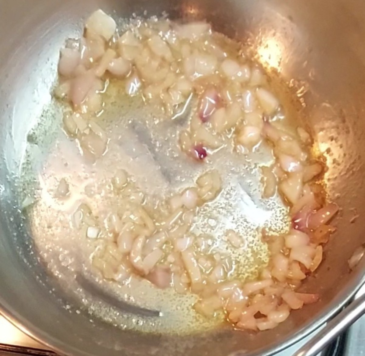 Add 1/2 cup onion and fry till golden brown.