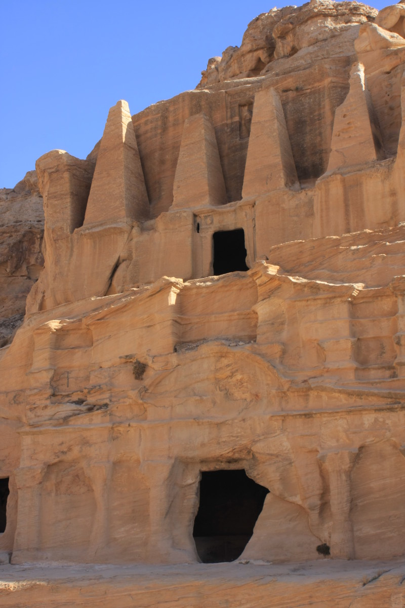 The 'Obelisk' Tomb (above) and ceremonial banquet room (below), near the entrance to Petra