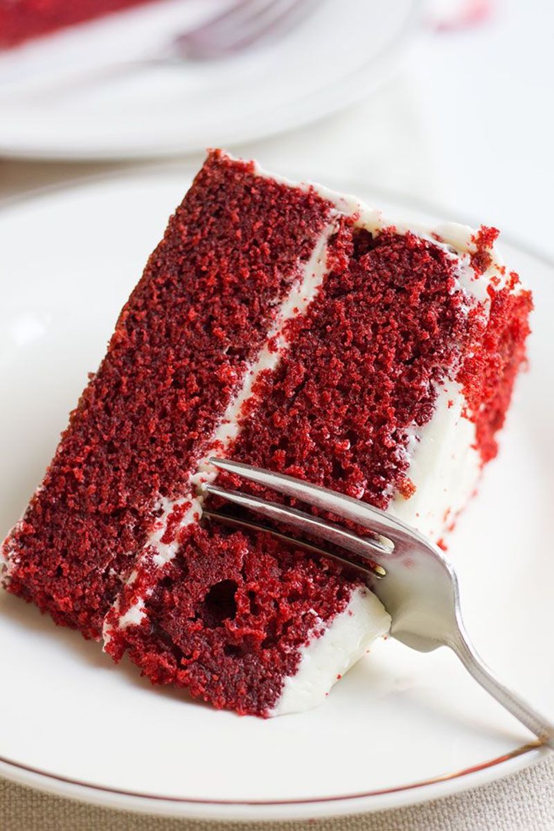 Making a good Red Velvet cake takes a lot of work, but you can use a box mix with some good cream cheese and sour cream that will knock you off your feet