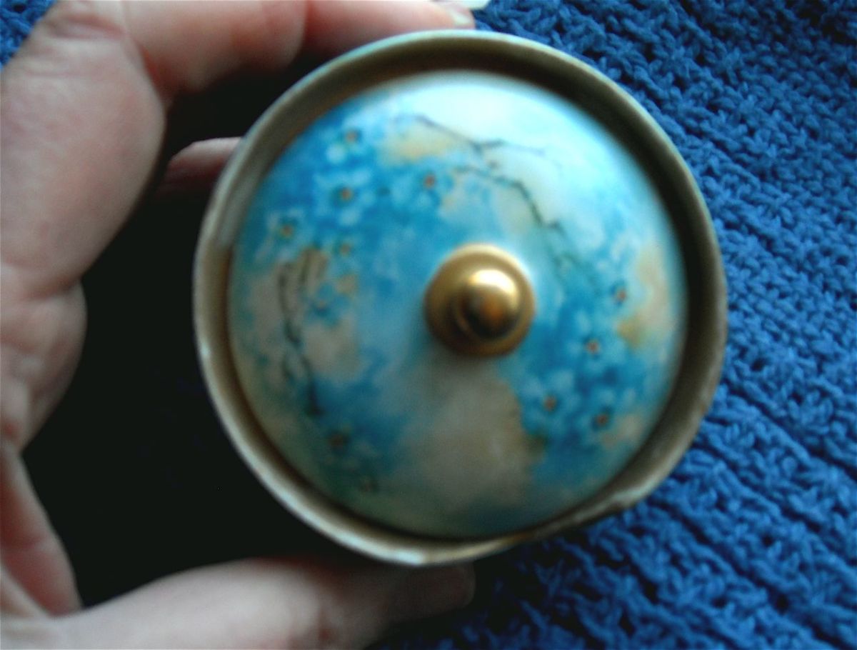 Antique collar button dish with a delicately painted cover. --A gift from our former neighbors.
