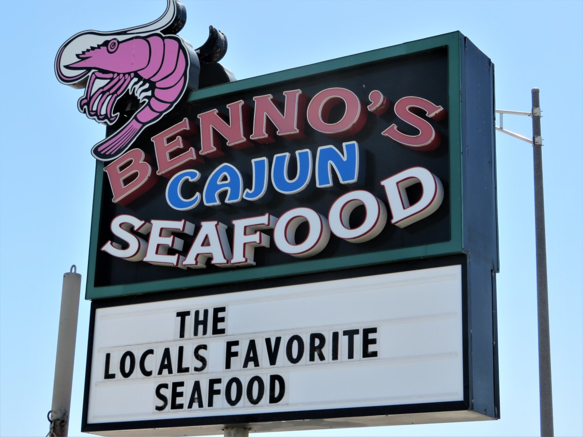 The restaurant sign notes that it is a local seafood favorite.