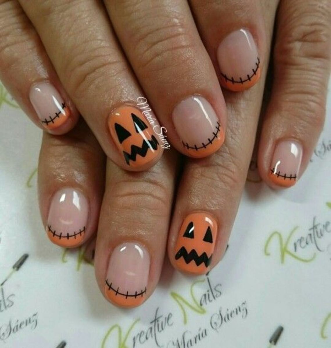 Show you are ready for Halloween with Jack-O-Lantern designs on your nails!
