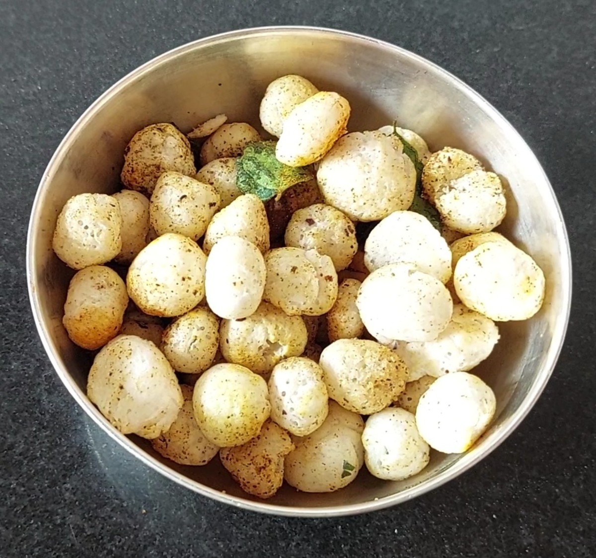 Spicy, crispy and tasty lotus seeds chiwda is ready to serve.