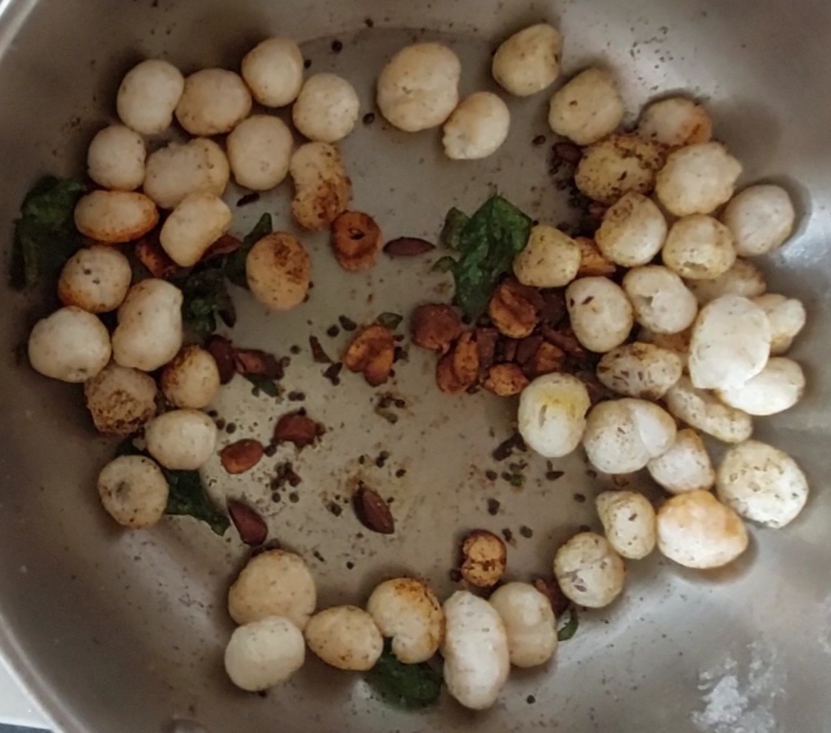 Mix well to combine lotus seeds with spices (use hands or spatula to mix).