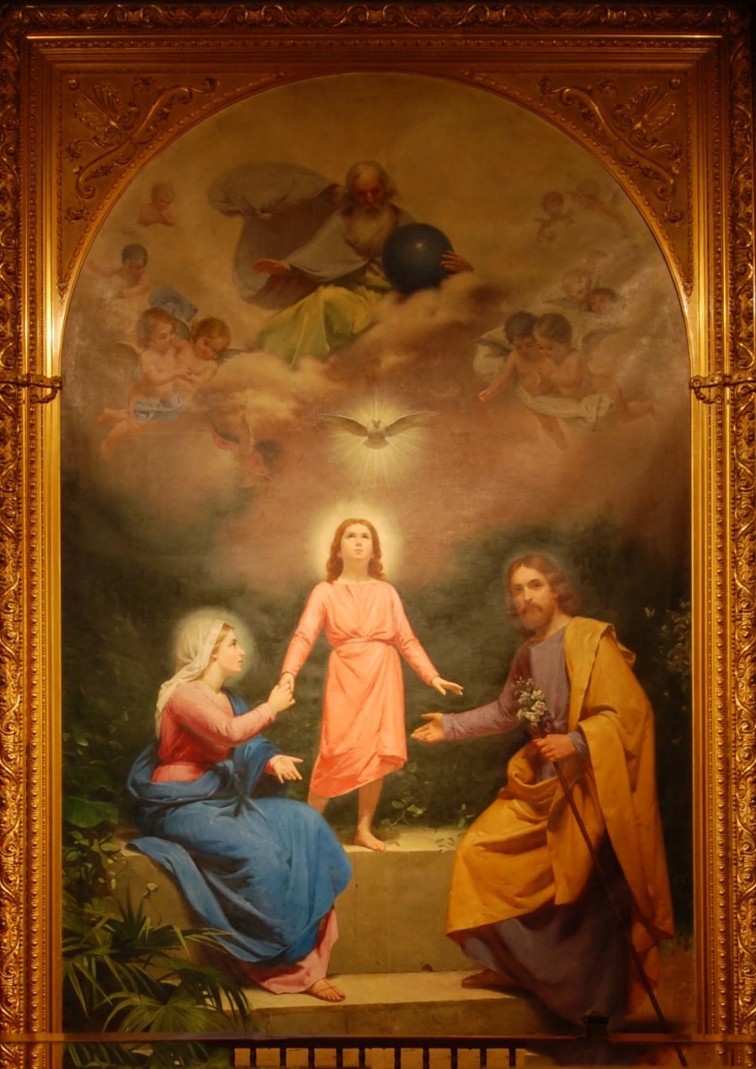 This painting shows the earthly trinity of Jesus, Mary, and Joseph, and the heavenly Trinity of the Father, Son, and Holy Spirit. Chapel of the Santa Clara Mission 