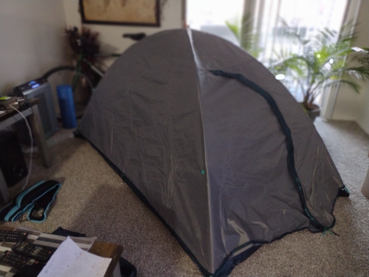 The Quechua MH100 Waterproof 2-person tent set up in my living room.
