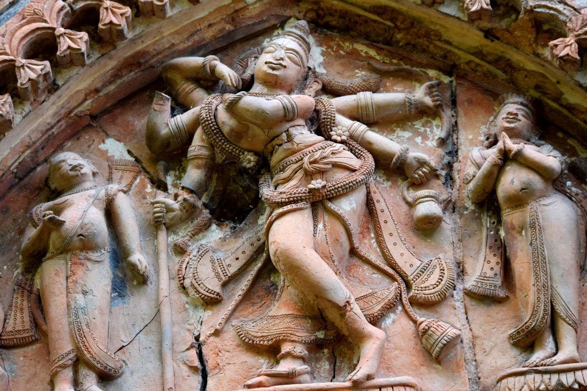 Shadbhuja Gauranga, terracotta; Ratneshwar temple, Bhattabati, Murshidabad. There are 2 persons accompanying Shadbbhuja Gauranga.
