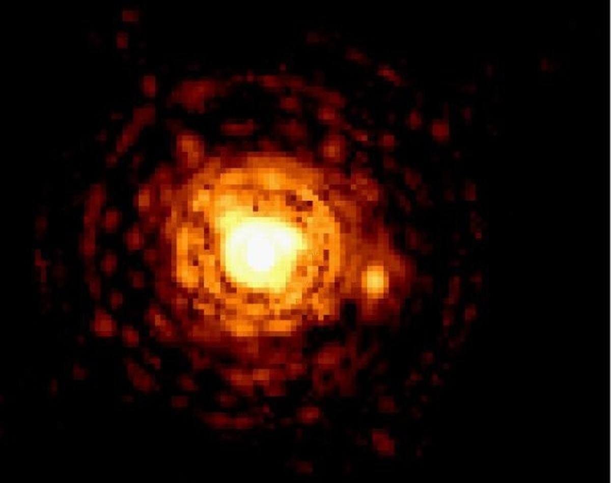 Binary red dwarf stars (Gliese 623) that are 26 light years from Earth. The smaller star is only 8% of the Sun's diameter.