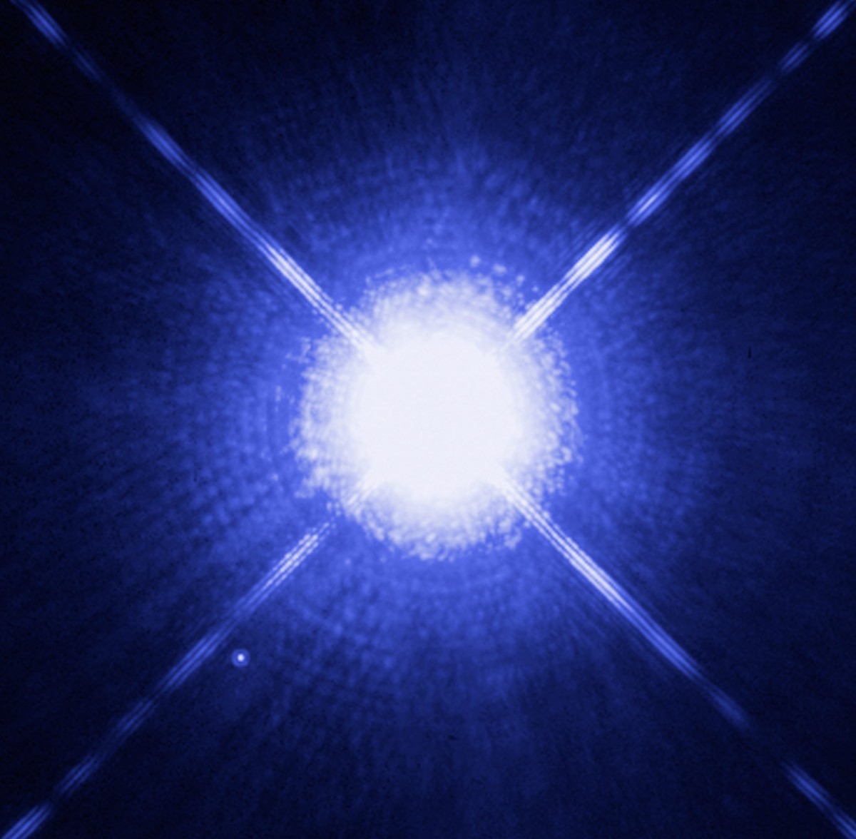 Can you see Sirius A's tiny white dwarf companion, Sirius B? (lower left)