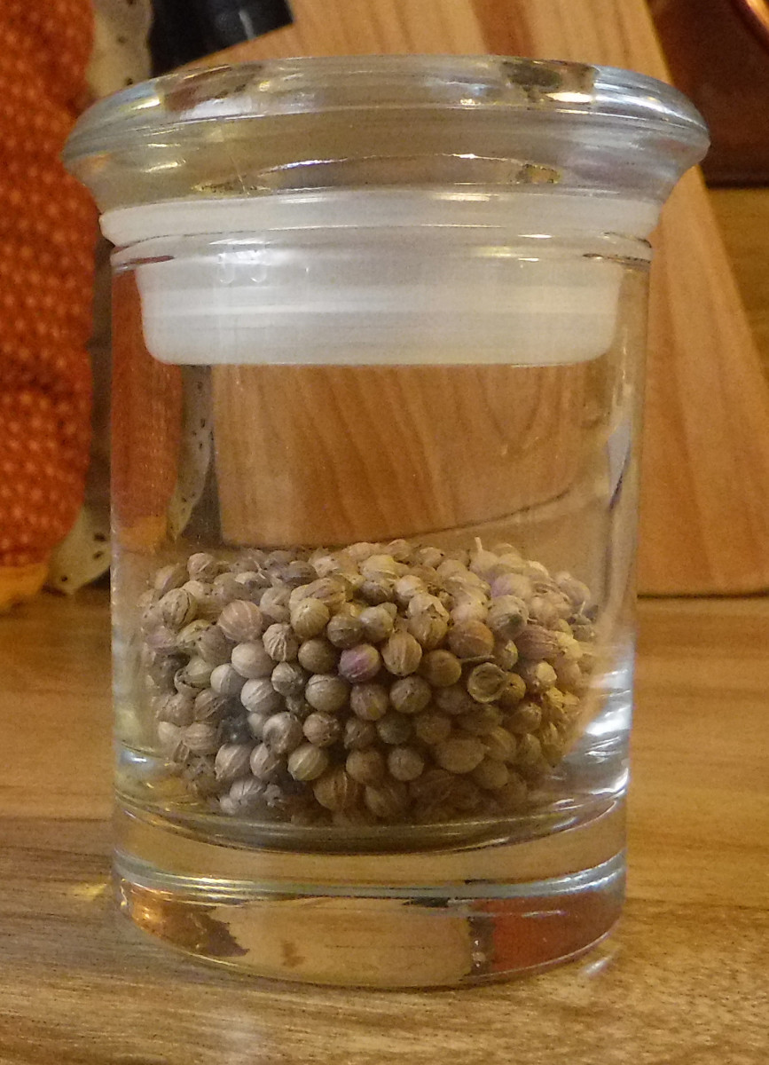 Store coriander in a glass container with a lid.