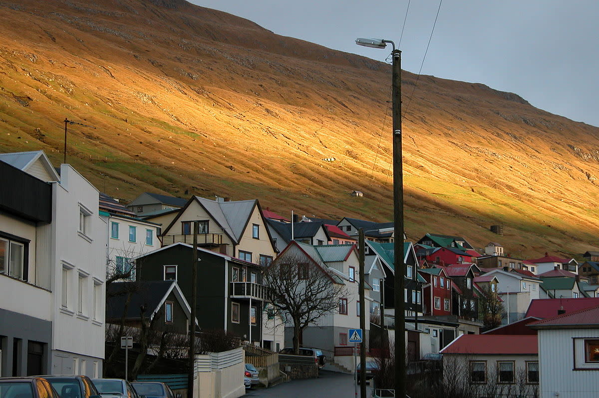 Winter Sunlight Illuminates the Mountainside in Vagur