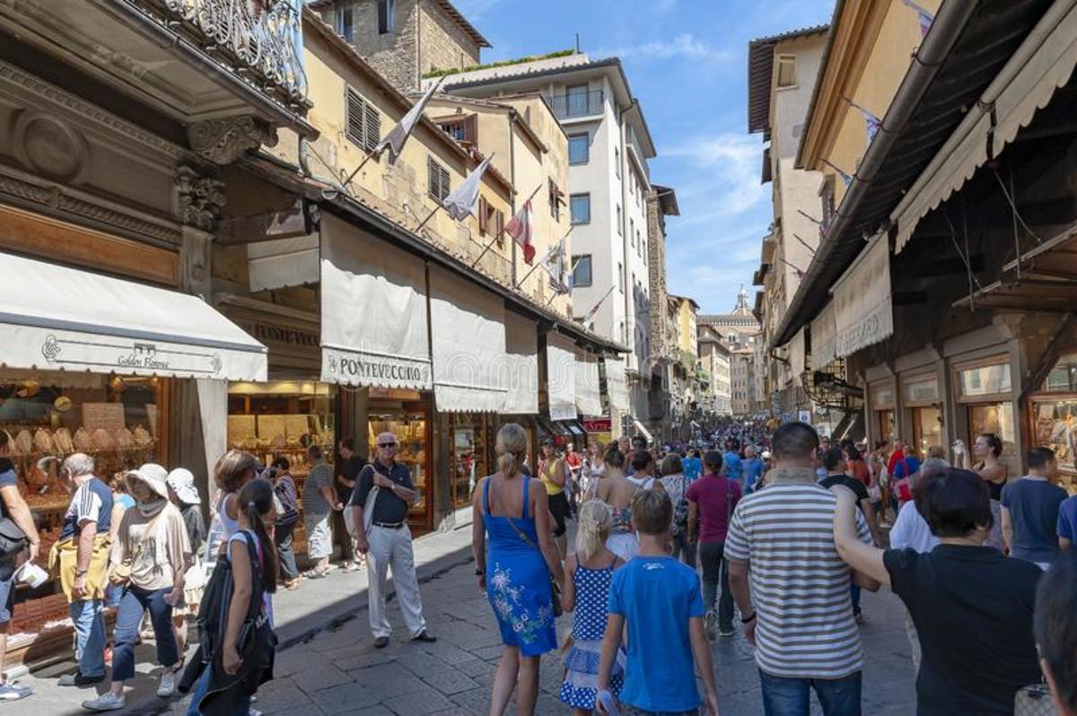 Stroll by the Shops Located Atop the Ponte Vecchio Bridge