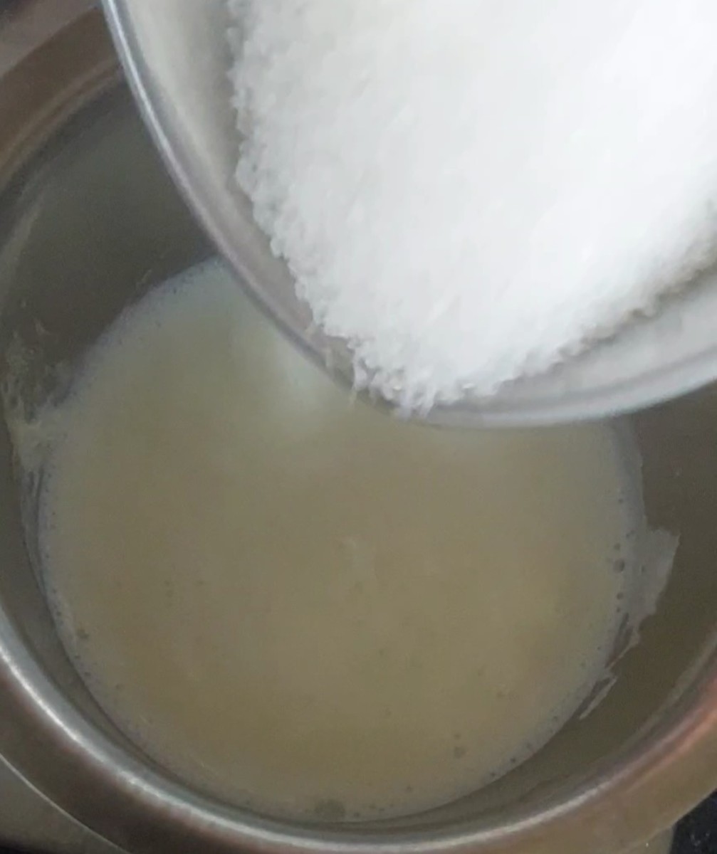 Add 1/2 cup of sugar, stir and let the sugar dissolve completely.