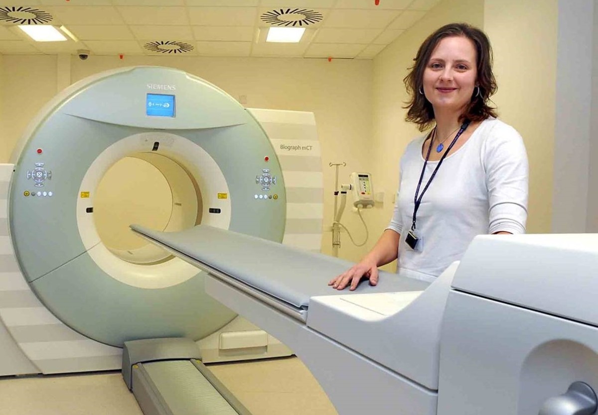 A medical physicist with a PET scanner.