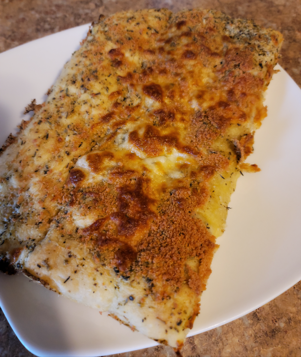 I love Pizza Hut breadsticks, but my teen prefers Marco's Pizza Cheesy Bread. My homemade breadsticks take inspiration from both!