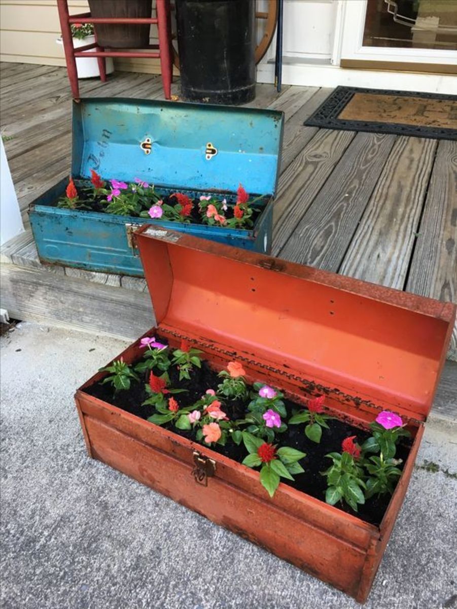 Rusty metal tool boxes turned planters