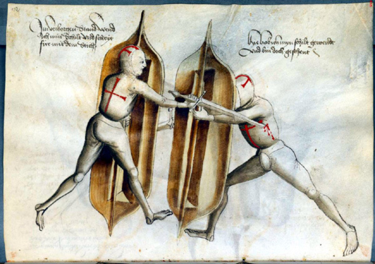 Dueling shields, apparently, could be used by themselves or with other weapons