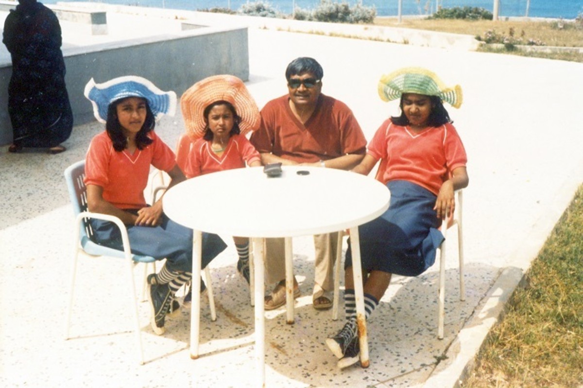 Pic: My sisters, My Dad, and Myself (Rightmost) [My brother wasn't born yet!]