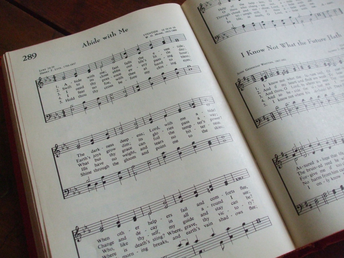 A Protestant hymnal opened to a song.