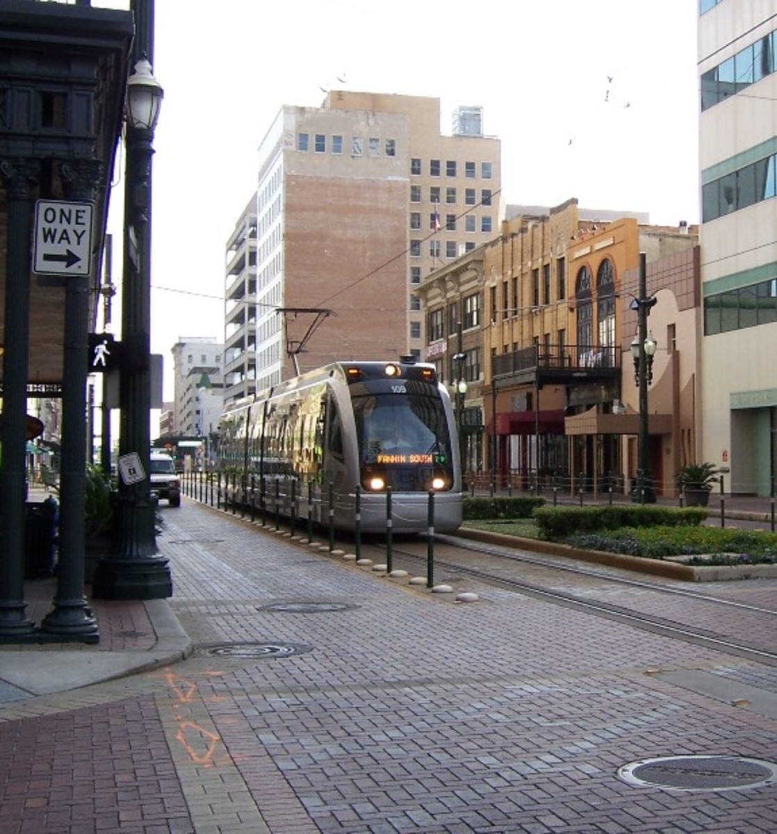 Houston MetroRail running in surface alignment on Main St. in city's downtown. 