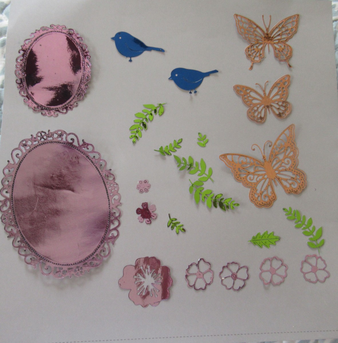 You can die cut toner paper and run it through a laminator to create amazing embellishments for your scrapbooks, cards and journals