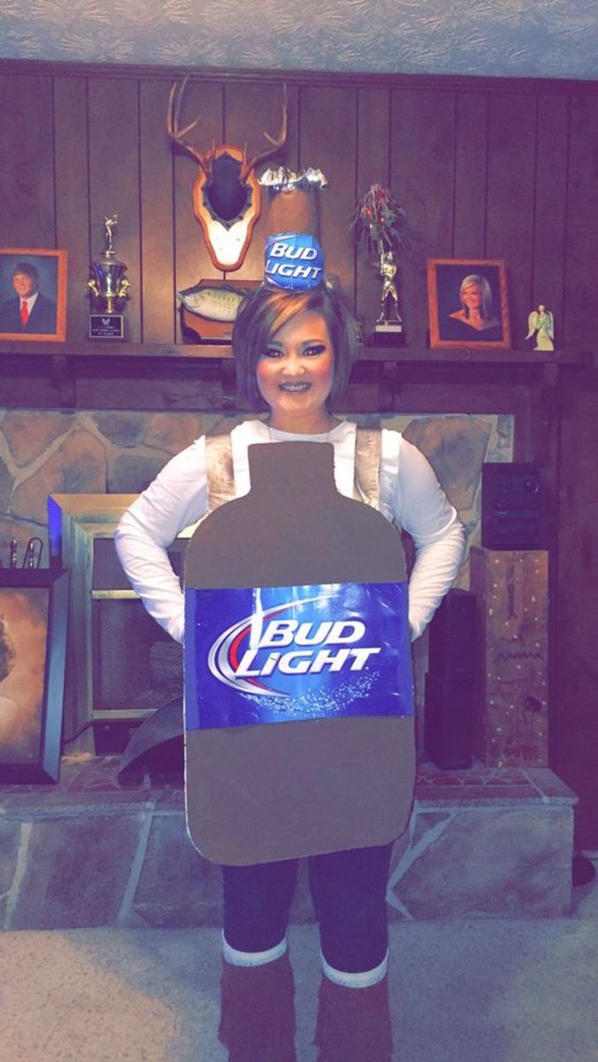 DIY beer bottle costume made from poster board, a cup, a case of beer, paint, duck tape & a hot glue gun.