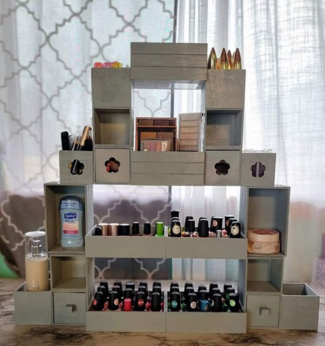 Makeup storage—use wooden boxes from Dollar Tree to customize a makeup organizer tower.