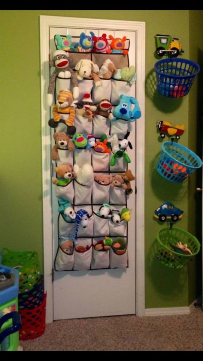 Organization! Kids rooms idea: toys, stuffed animals, balls, gloves . . . a place for everything. Those baskets are available from Dollar Tree and just hung on hooks. You could even use command hooks.