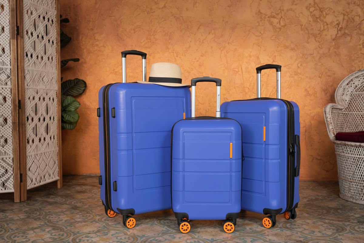 Owning a brightly-colored suitcase can help you distinguish your own belongings from a lineup of dark and neutral tones!