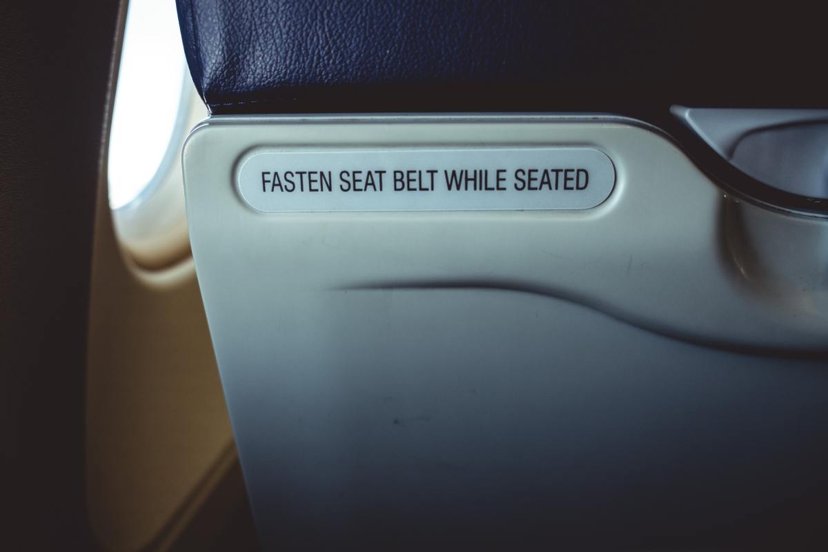 Investing in a seat belt extender can make your seated time on the plane feel more comfortable.