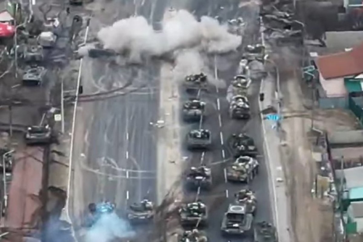 Russian armored column getting ambushed by Ukrainian forces.