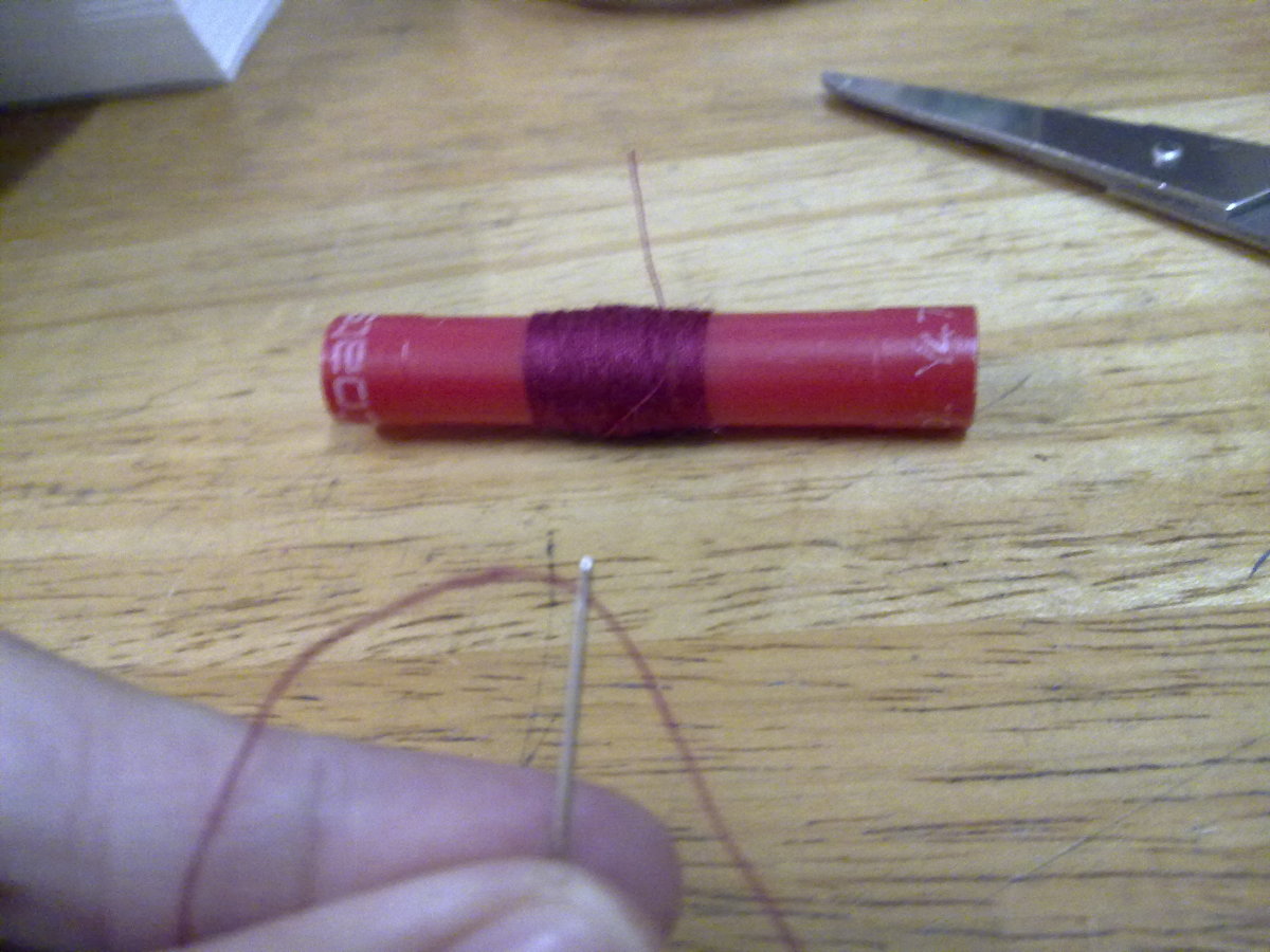 2 strands of red thread