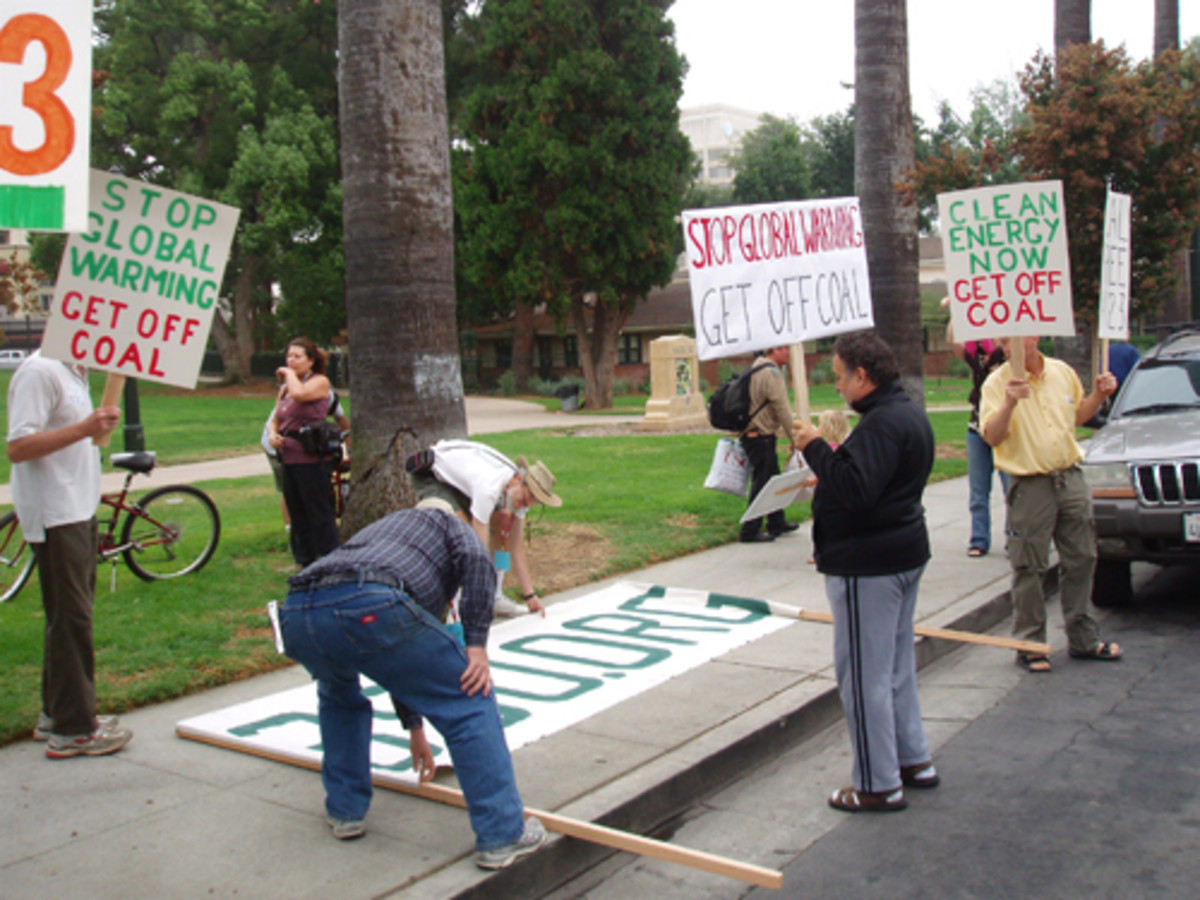 Picketing in public places gets the attention of passersby, who often honk in agreement.